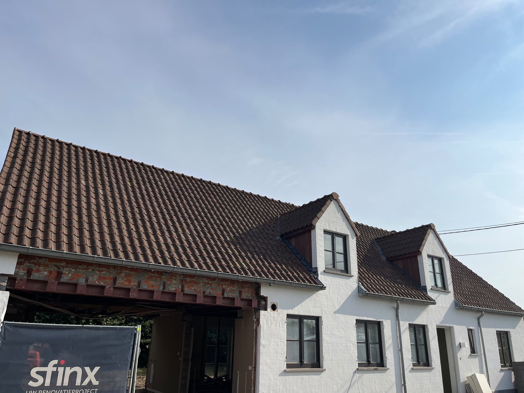 Bestaand dak van Project Damme voor de werken